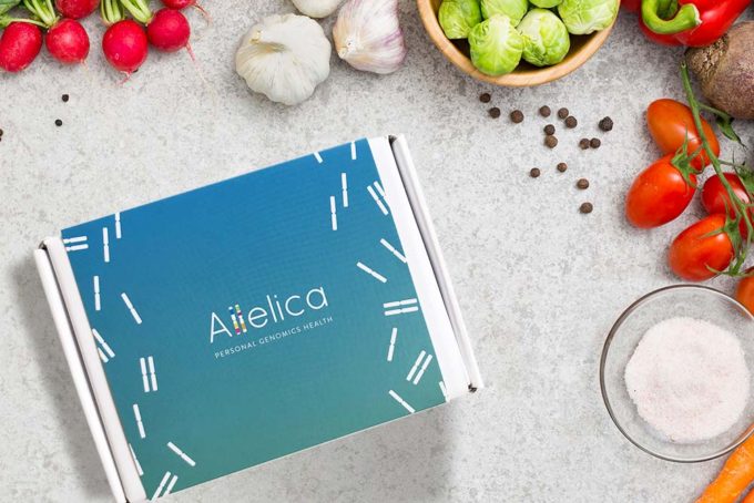 Allelica pack on a table full of fruits and vegetable