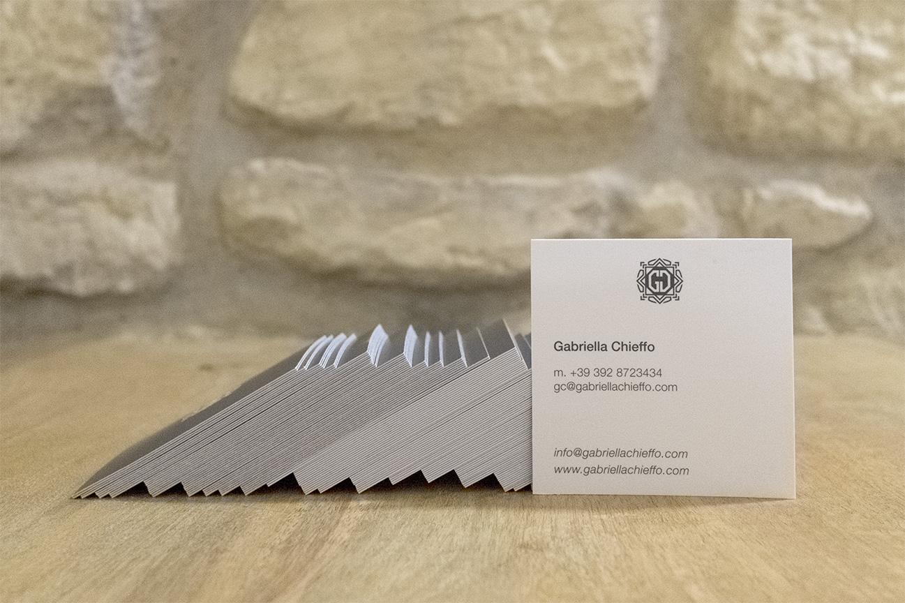 Business card with soft touch finishes